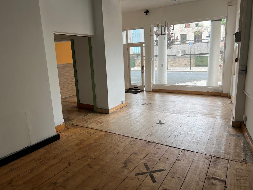 Lot: 47 - TWO STOREY TOWN CENTRE COMMERCIAL PREMISES - Looking Towards the Street From the Rear of the Shop